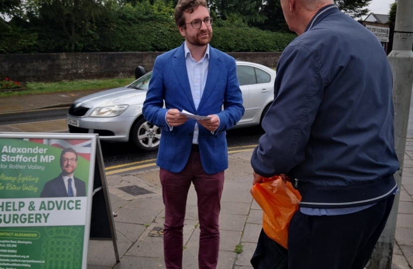 Alexander Stafford MP speaking to resident in Swallownest