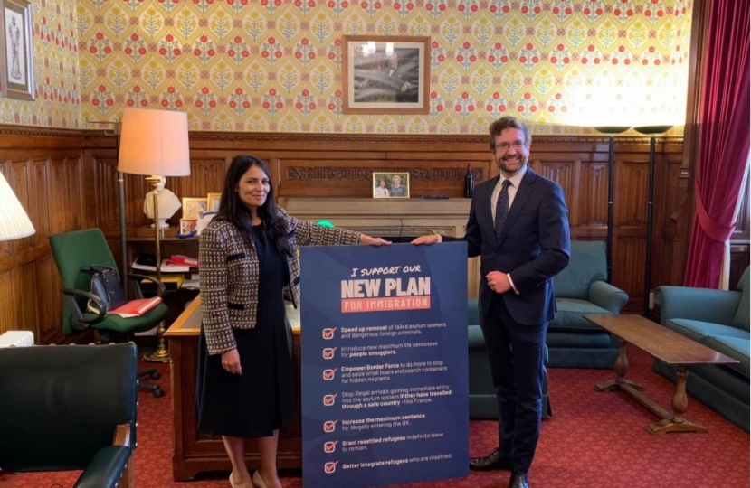 Alexander Stafford with Priti Patel in a Parliament office