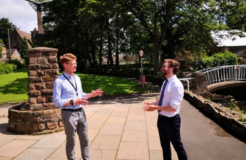 Alexander Stafford MP speaks to Cllr David Fisher in Whiston