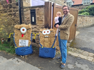 Alexander Stafford with minion haybales