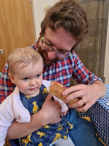 Alexander Stafford with baby daughter at fair