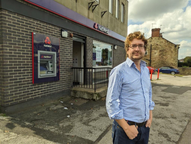 Alexander outside former NatWest branch in Wickersley.